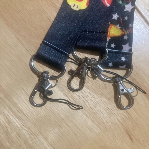 4/$25 Super Mario Brothers lanyard. You get all 3 for the $. 3 diff designs. - Picture 3 of 3